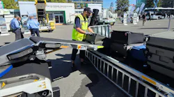 The tail loader is an extension mounted at the rear of Power Stow's Rollertrack Conveyor.