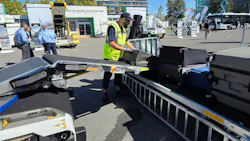The tail loader is an extension mounted at the rear of Power Stow's Rollertrack Conveyor.