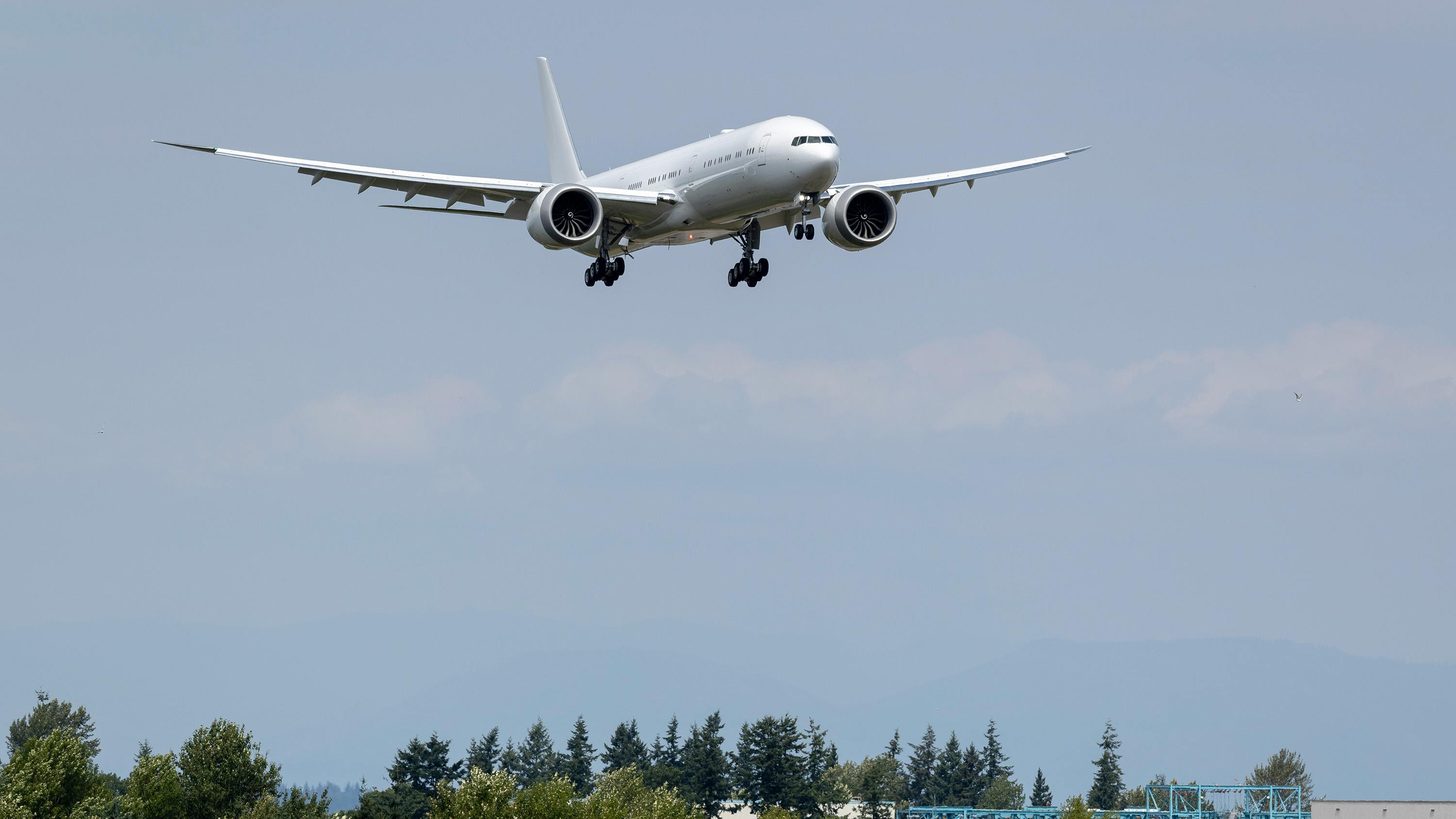 Boeing&rsquo;s fifth 777X makes its final approach into Paine Field as part of its inaugural flight on Aug. 5, 2025, in Everett, Washington.