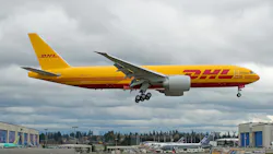 A DHL Aerologic Boeing 777 freighter cargo plane landing.