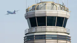 An American Airlines Airbus A319 airplane takes off past the air traffic control tower at Ronald Reagan Washington National Airport in Arlington, Va., on Jan. 11, 2023.