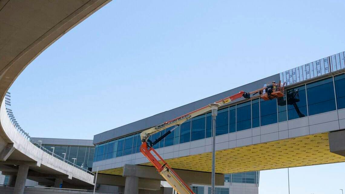 Construction continues on the new pedestrian walkway at Sacramento International Airport on Wednesday, June 17, 2026. Two road closures will be in place this fall during construction of the pedestrian walkway.