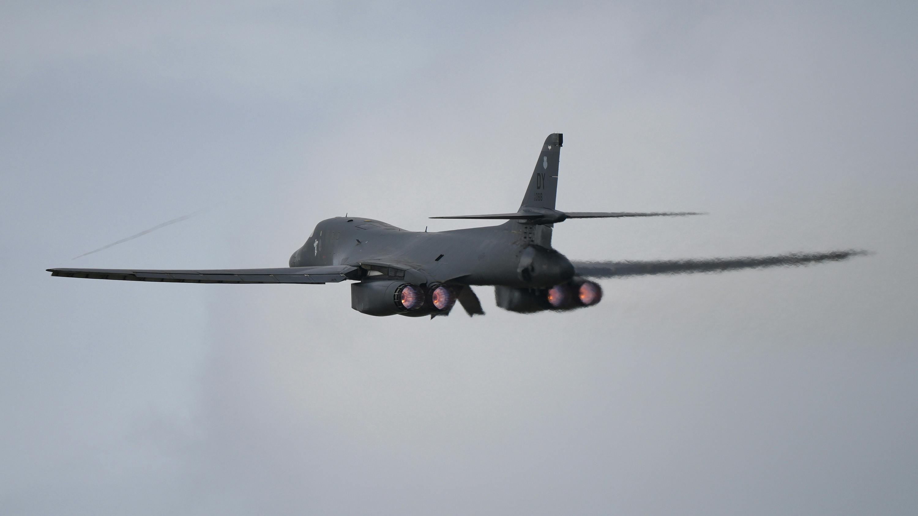 A U.S. Air Force B-1B Lancer bomber fully laden with munitions takes off from RAF Fairford on March 13, 2026, in Fairford, England.