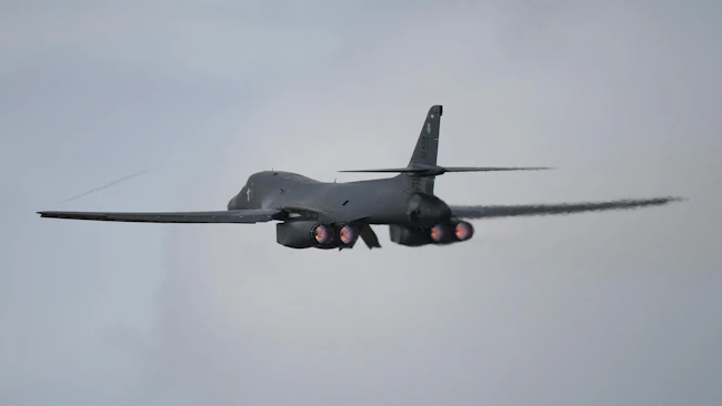 A U.S. Air Force B-1B Lancer bomber fully laden with munitions takes off from RAF Fairford on March 13, 2026, in Fairford, England.