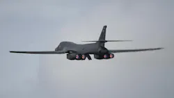 A U.S. Air Force B-1B Lancer bomber fully laden with munitions takes off from RAF Fairford on March 13, 2026, in Fairford, England.