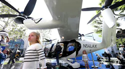 LOS ANGELES, CA - - SEPTEMBER 26, 2024 - Cleo Sinnott, 3, left, and her sister Maja, 2, from Sydney, Australia, visit with a flying taxi created by Joby Aviation at The Grove in the Fairfax District in Los Angles on September 25, 2024. Joby Aviation, Inc., is one of a handful of companies racing to be the first to make flying taxis a reality in Los Angeles. The California-based transportation company has developed the all-electric, vertical take-off and landing air taxi which it intends to operate as part of a fast, quiet, and convenient service in cities around the world.