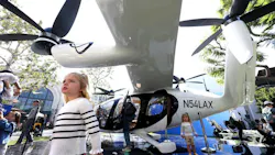 LOS ANGELES, CA - - SEPTEMBER 26, 2024 - Cleo Sinnott, 3, left, and her sister Maja, 2, from Sydney, Australia, visit with a flying taxi created by Joby Aviation at The Grove in the Fairfax District in Los Angles on September 25, 2024. Joby Aviation, Inc., is one of a handful of companies racing to be the first to make flying taxis a reality in Los Angeles. The California-based transportation company has developed the all-electric, vertical take-off and landing air taxi which it intends to operate as part of a fast, quiet, and convenient service in cities around the world.