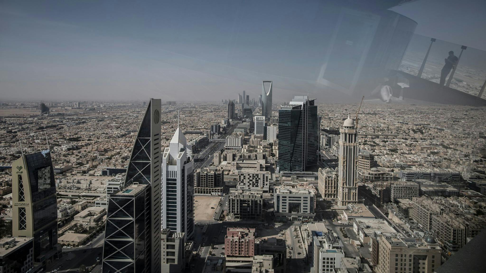 FILE PHOTO - A picture made available on 18 April 2018 shows a visitor reflecting in a window at a vantage point overlooking Riyadh, Saudi Arabia, 09 February 2018.