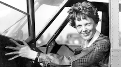 American aviator Amelia Earhart sits in the cockpit of an aircraft. Researchers have concluded an expedition to Nikumaroro Atoll in the Pacific in an effort to shed light on the disappearance of the pioneering aviator and her Lockheed Electra 10E.