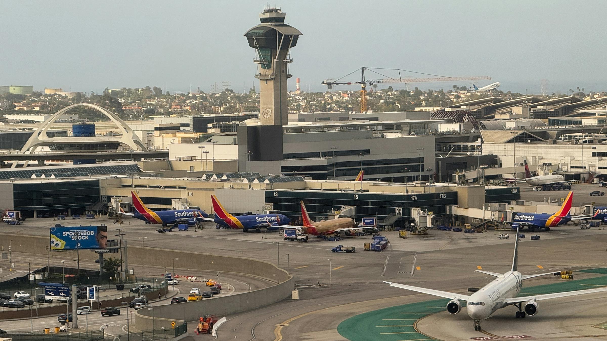 Southwest Airlines Co. Boeing 737 jets sit parked at Terminal 1 at Los Angeles International Airport (LAX) in Los Angeles, California on March 28, 2025.