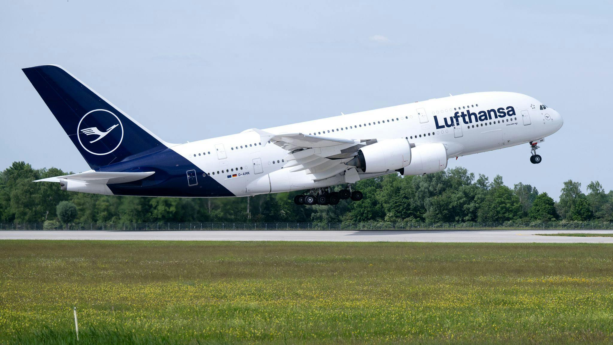 A Lufthansa Airbus A380 takes off from Munich Airport bound for Boston.=